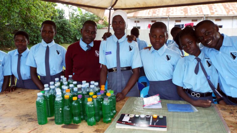 Kingstone High school student with their liquid soap they manufactured